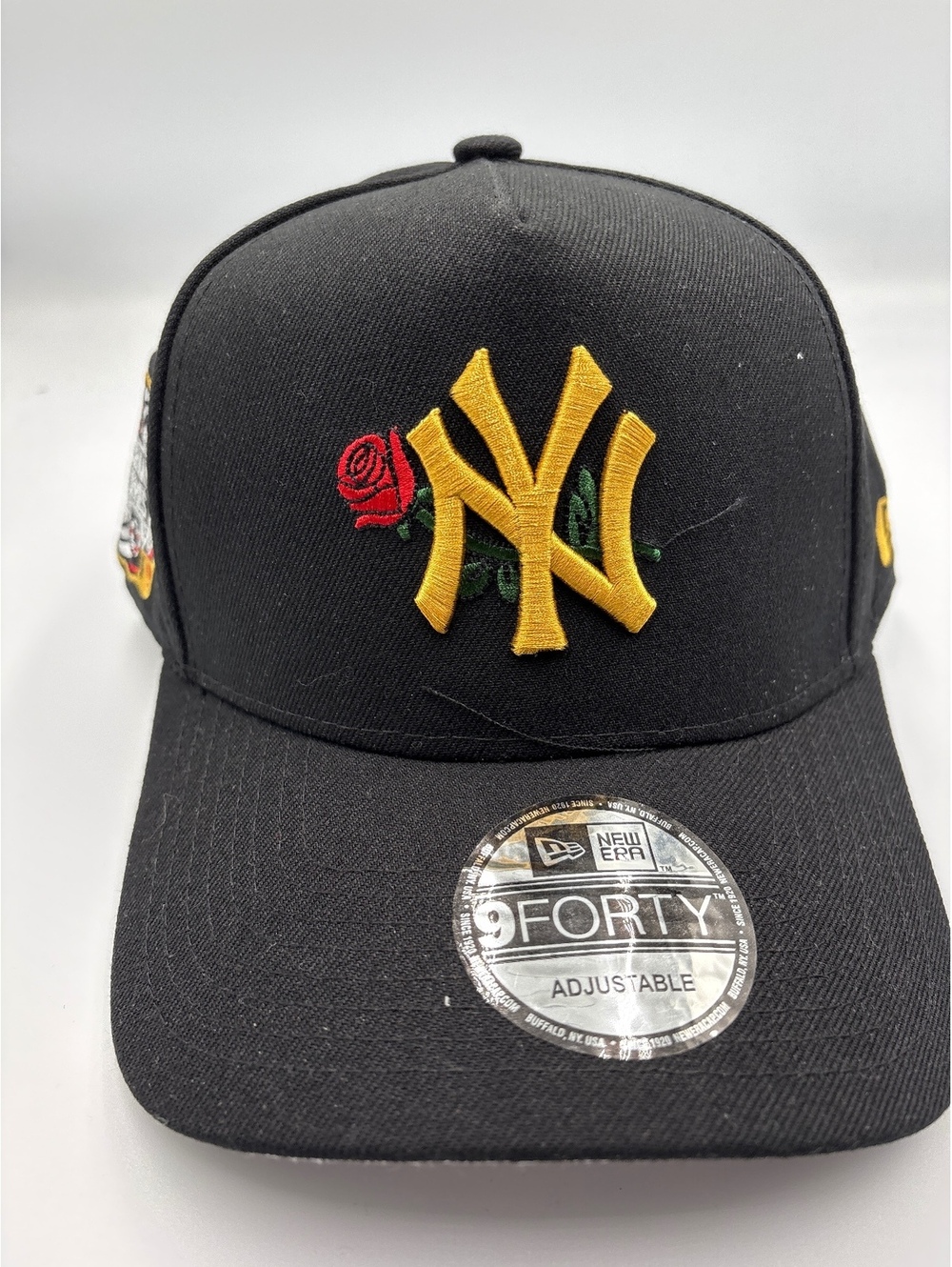 New Era 9FORTY Adjustable Black Baseball Cap with Yellow NY Logo and Rose